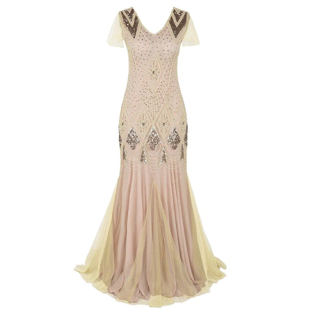 https://cdn.shopify.com/s/files/1/0998/9200/3147/files/charice-long-20s-flapper-dress-with-sequins-champagne-s-state_of_style-5.jpg?v=1766785272