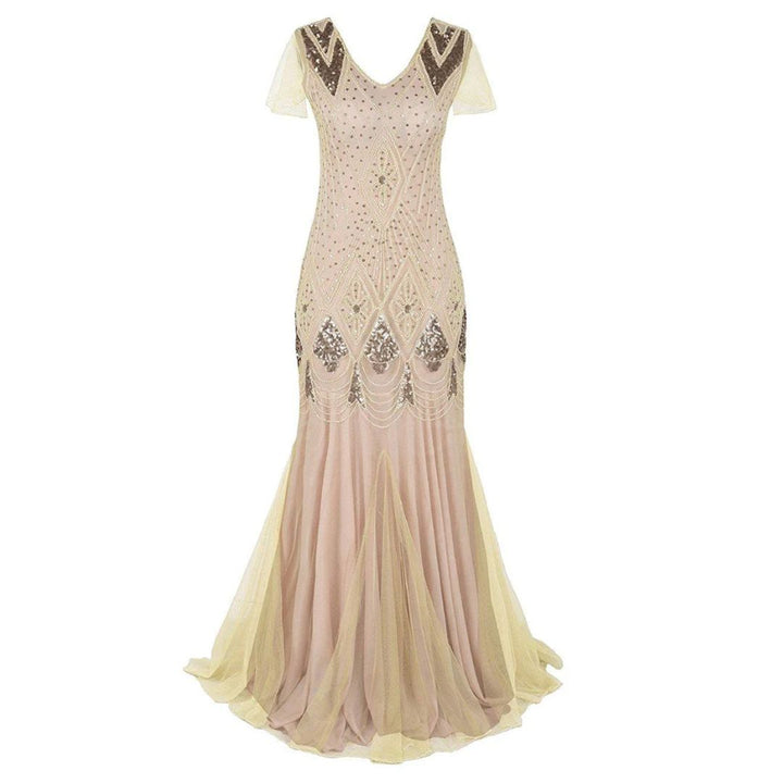 https://cdn.shopify.com/s/files/1/0998/9200/3147/files/charice-long-20s-flapper-dress-with-sequins-champagne-s-state_of_style-5.jpg?v=1766785272