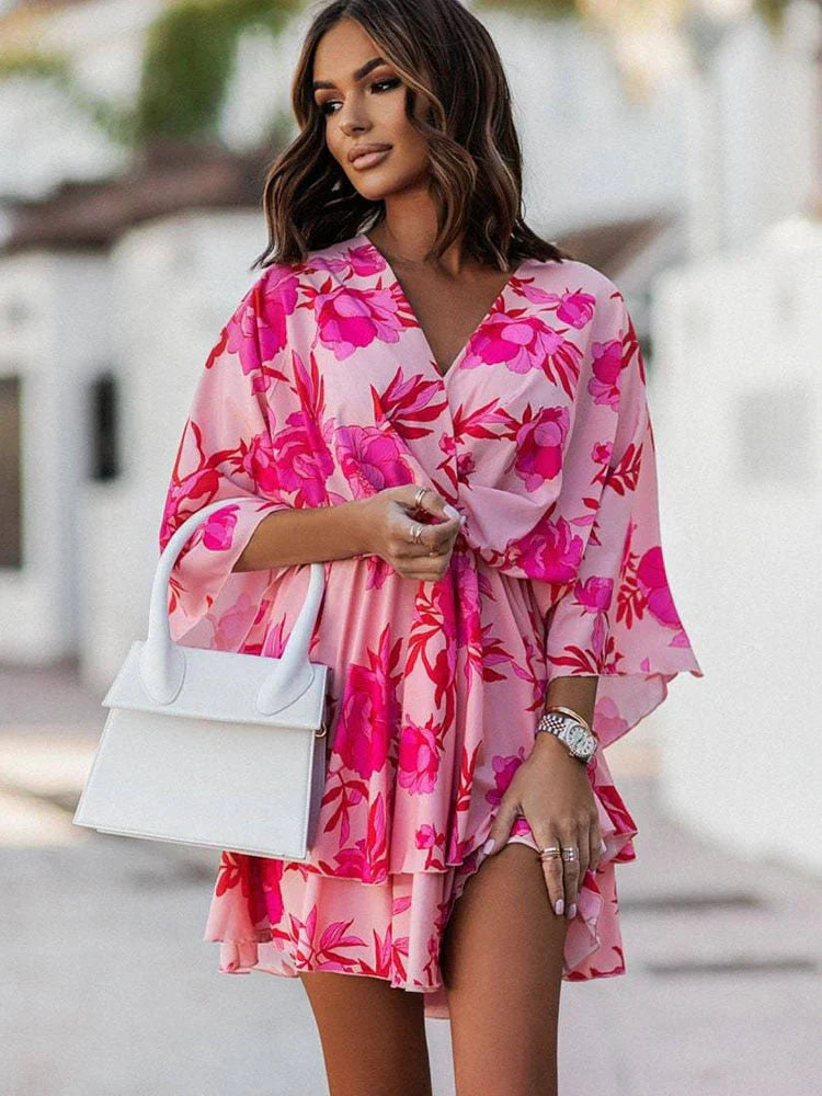 https://cdn.shopify.com/s/files/1/0998/9200/3147/files/chic-mini-dress-elegant-and-comfortable-orange-pink-s-state_of_style-10.webp?v=1766785287