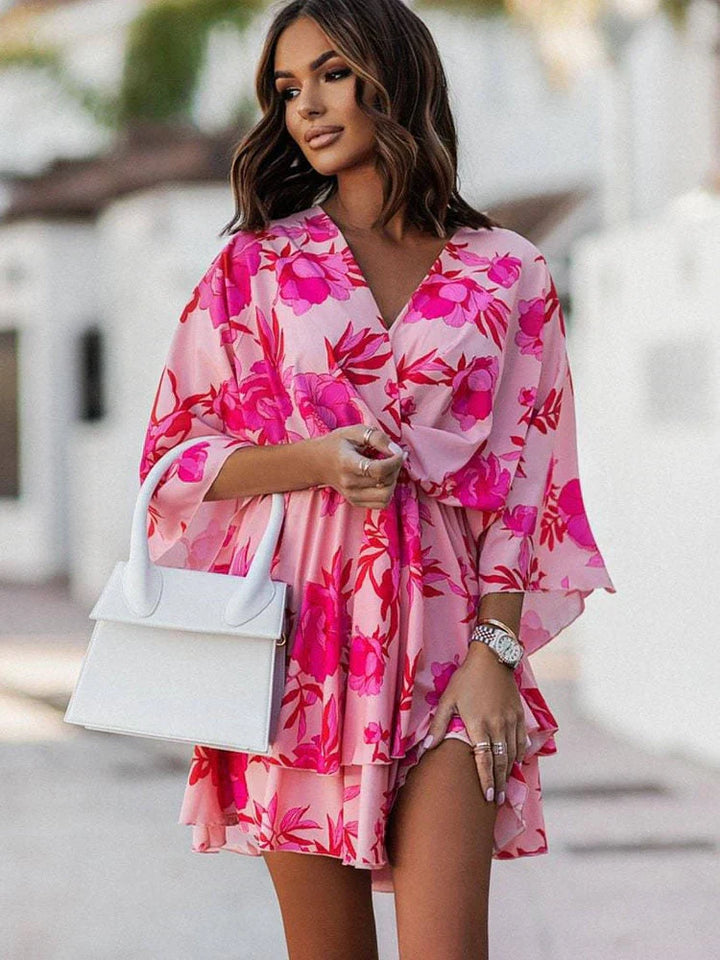 https://cdn.shopify.com/s/files/1/0998/9200/3147/files/chic-mini-dress-elegant-and-comfortable-orange-pink-s-state_of_style-10.webp?v=1766785287