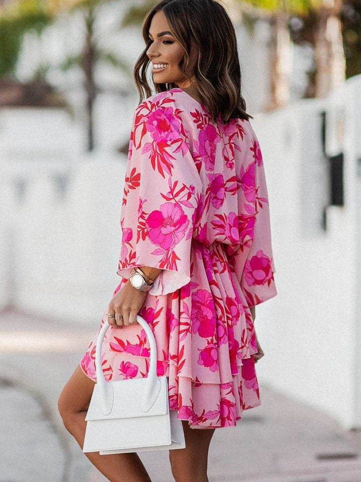 https://cdn.shopify.com/s/files/1/0998/9200/3147/files/chic-mini-dress-elegant-and-comfortable-orange-pink-s-state_of_style-12.webp?v=1766785286