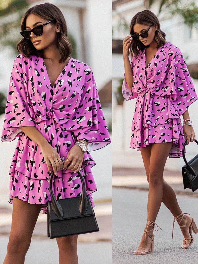 https://cdn.shopify.com/s/files/1/0998/9200/3147/files/chic-mini-dress-elegant-and-comfortable-orange-pink-s-state_of_style-14.webp?v=1766785287