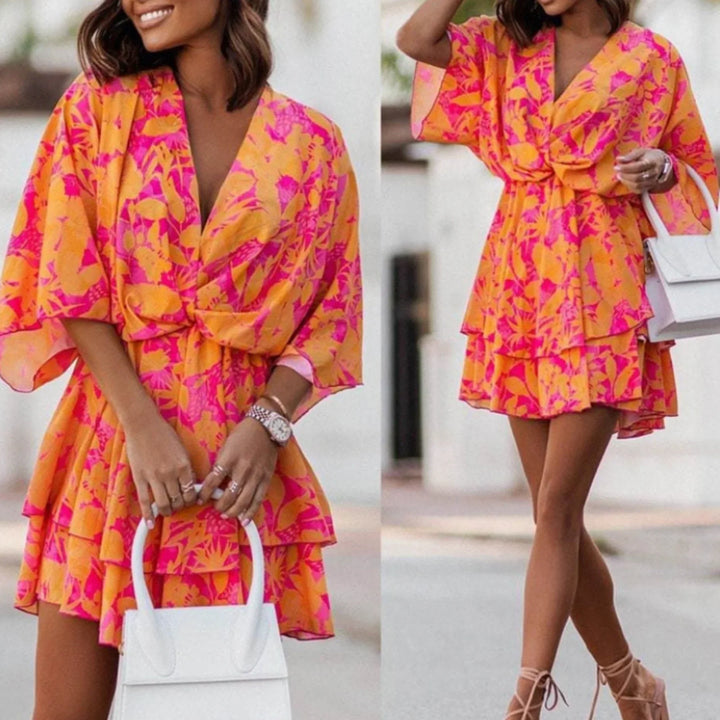 https://cdn.shopify.com/s/files/1/0998/9200/3147/files/chic-mini-dress-elegant-and-comfortable-orange-pink-s-state_of_style-2.webp?v=1766785287