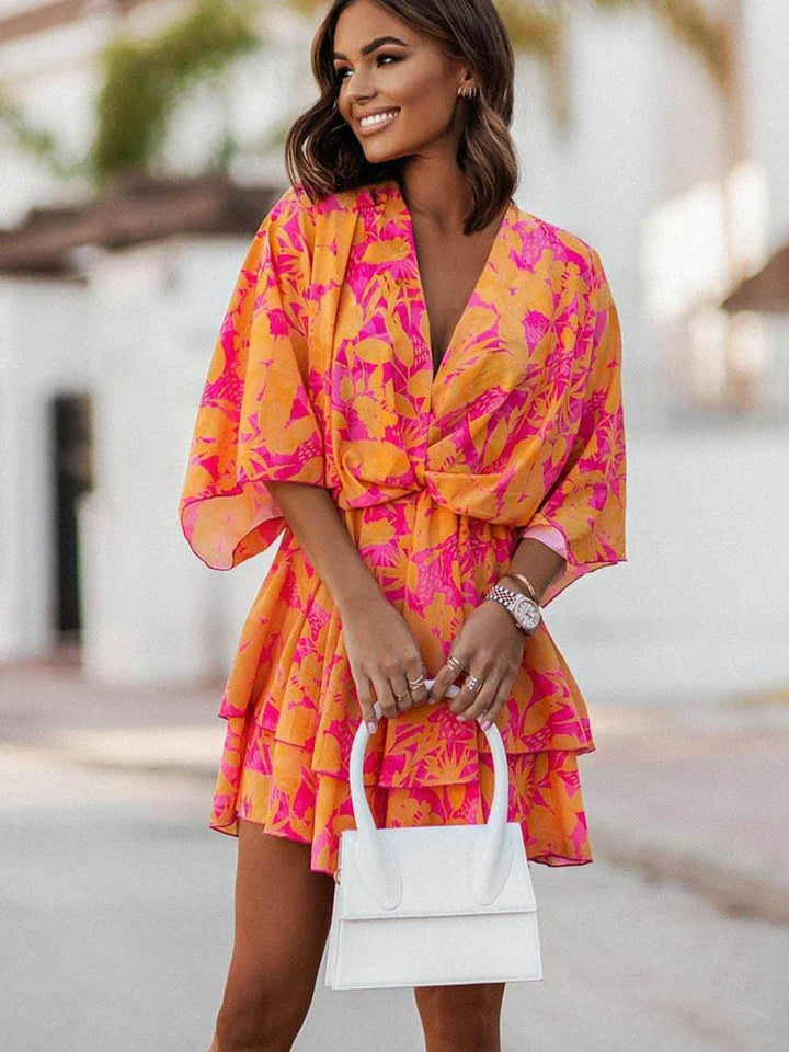 https://cdn.shopify.com/s/files/1/0998/9200/3147/files/chic-mini-dress-elegant-and-comfortable-orange-pink-s-state_of_style-9.webp?v=1766785286