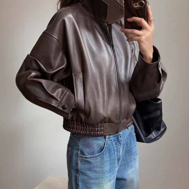 Women's leather jacket with faux leather ribbed trim, ideal for autumn and mid-season