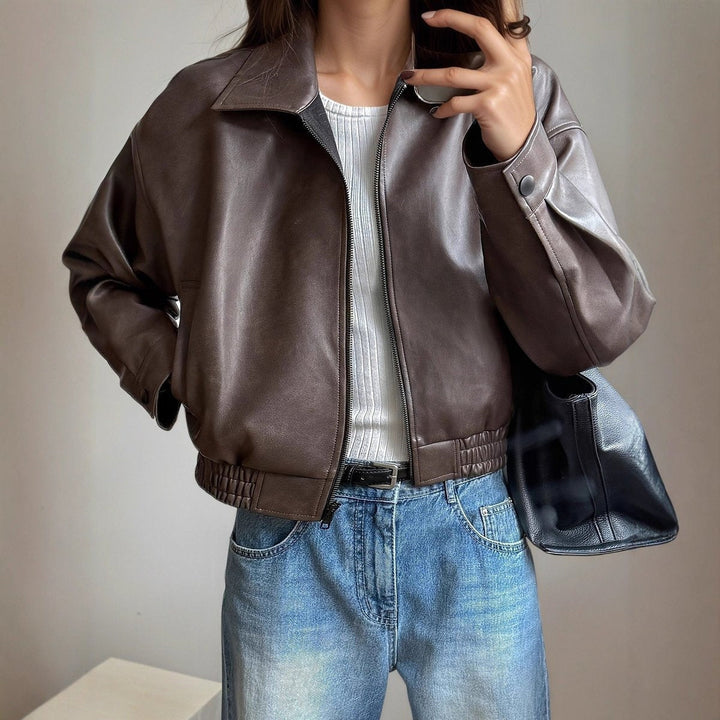 Women's leather jacket with faux leather ribbed trim, ideal for autumn and mid-season