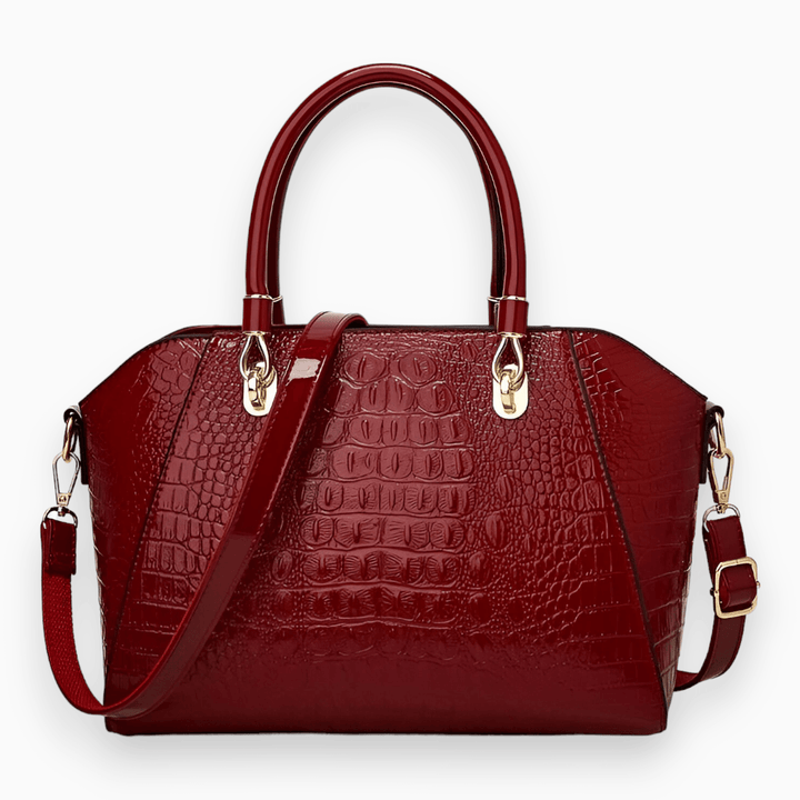Sac à main en cuir avec embossage crocodile, un look luxueux et élégant.