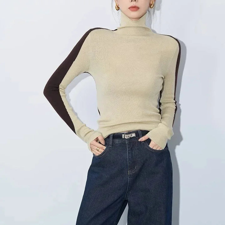 Blouse femme en coton à col montant et manches contrastées, modèle tendance pour l’automne