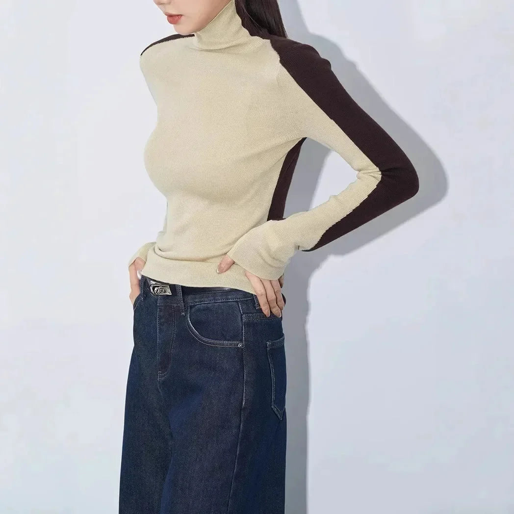 Blouse femme en coton à col montant et manches contrastées, modèle tendance pour l’automne