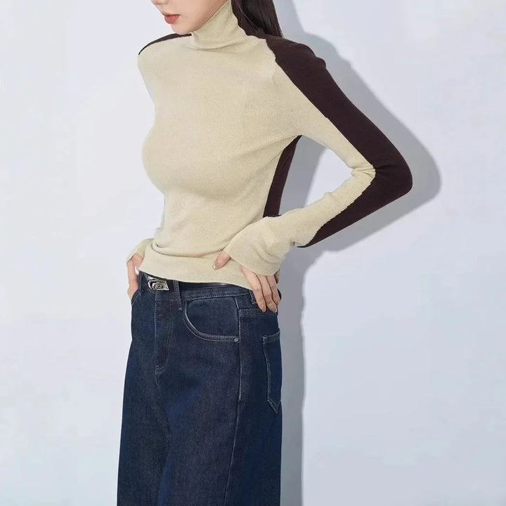 Blouse femme en coton à col montant et manches contrastées, modèle tendance pour l’automne