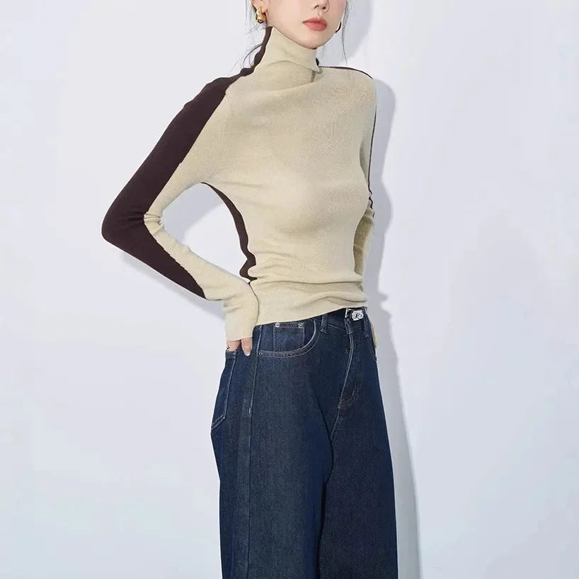 Blouse femme en coton à col montant et manches contrastées, modèle tendance pour l’automne