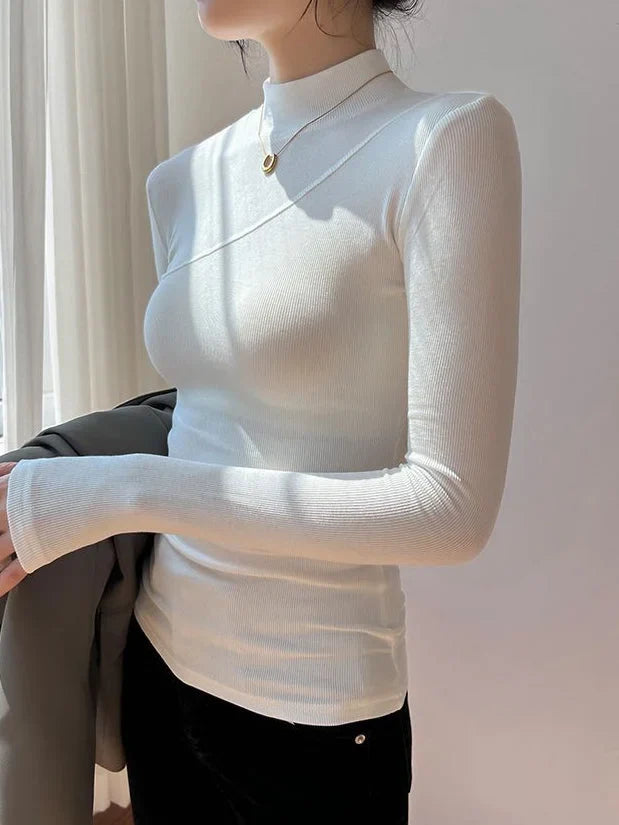 Blouse femme en coton à manches longues et col montant, modèle élégant pour l’automne