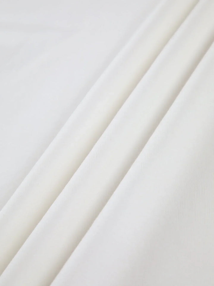 Blouse femme en coton à manches longues et col montant, modèle élégant pour l’automne