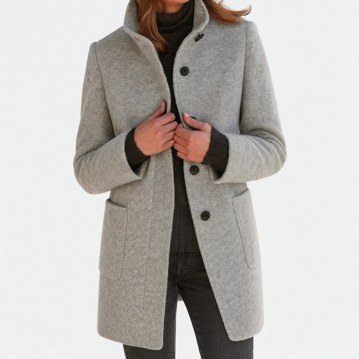 Elegant, straight-cut women’s wool jacket with a stand collar for autumn