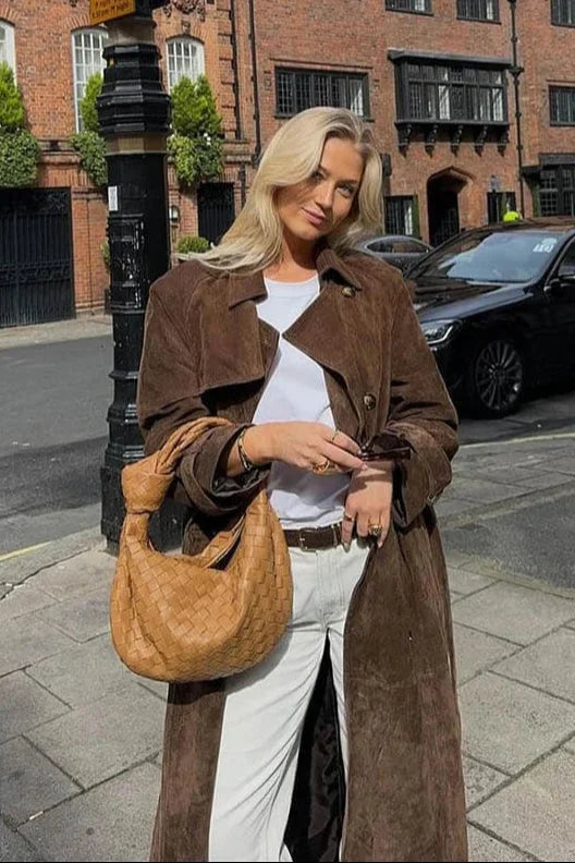 Women’s trench coat with a belt and elegant notched collar for cool autumn days