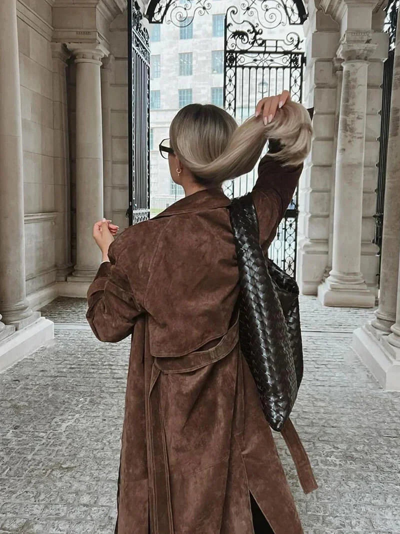 Women’s trench coat with a belt and elegant notched collar for cool autumn days