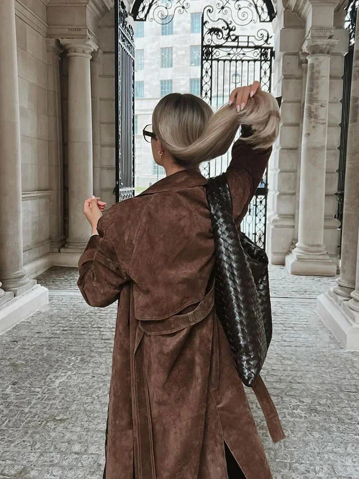 Women’s trench coat with a belt and elegant notched collar for cool autumn days