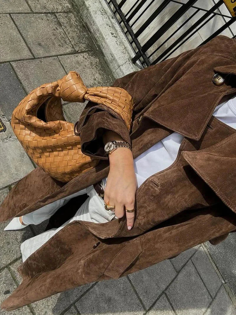 Women’s trench coat with a belt and elegant notched collar for cool autumn days