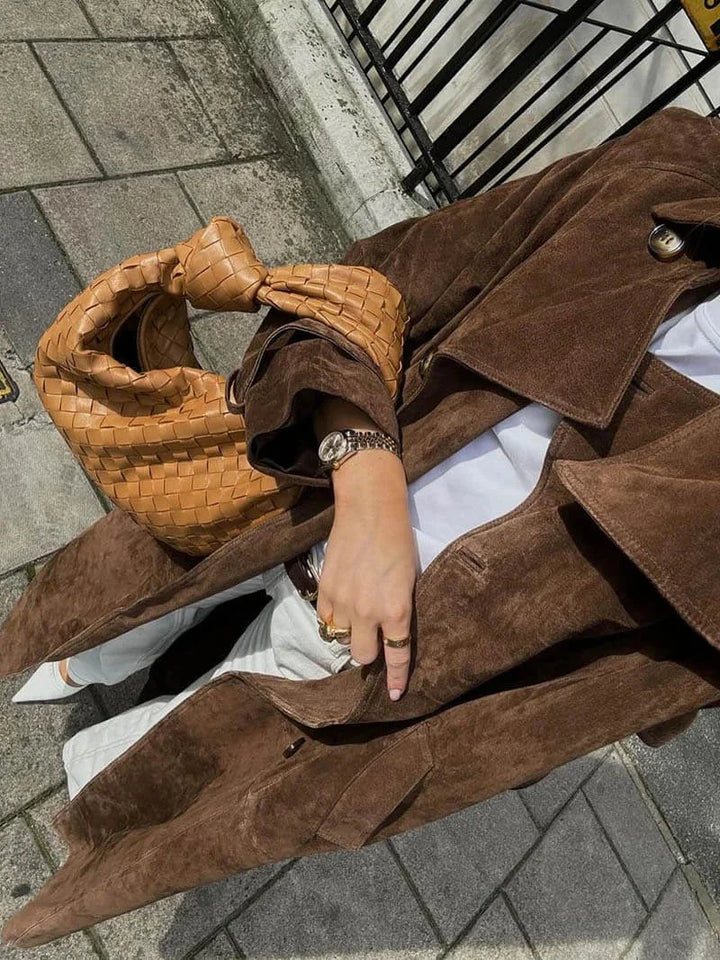 Women’s trench coat with a belt and elegant notched collar for cool autumn days