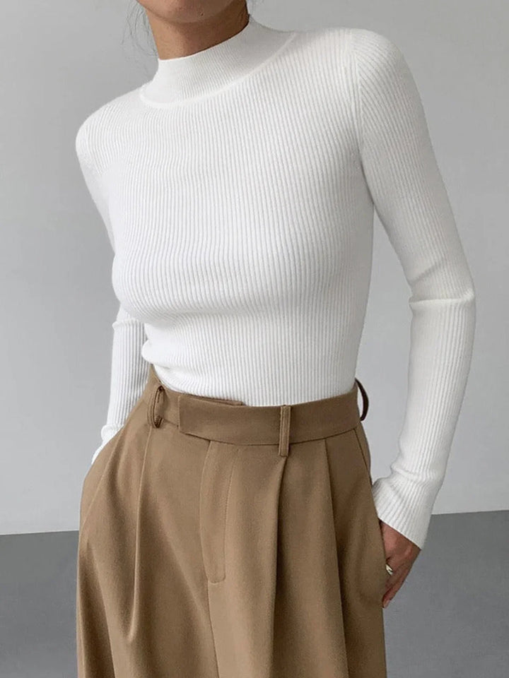 Pull femme en laine côtelée à col montant, coupe élégante et confortable pour l’automne