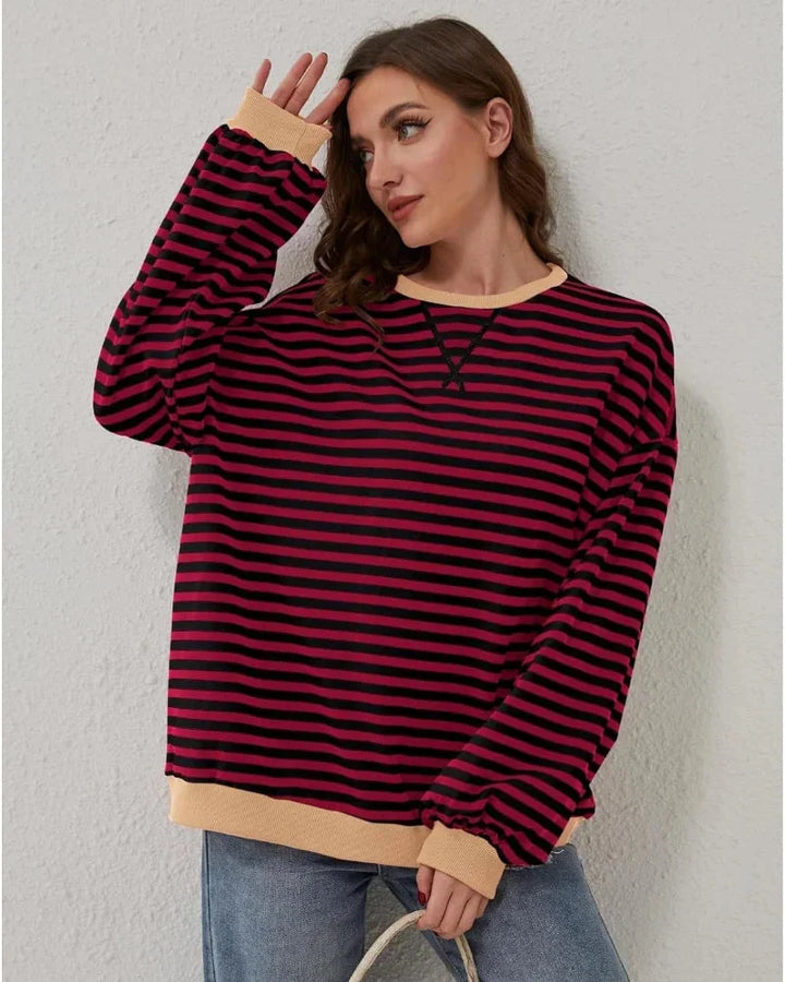 Women’s striped knit pullover with a loose fit, a casual and trendy style for autumn
