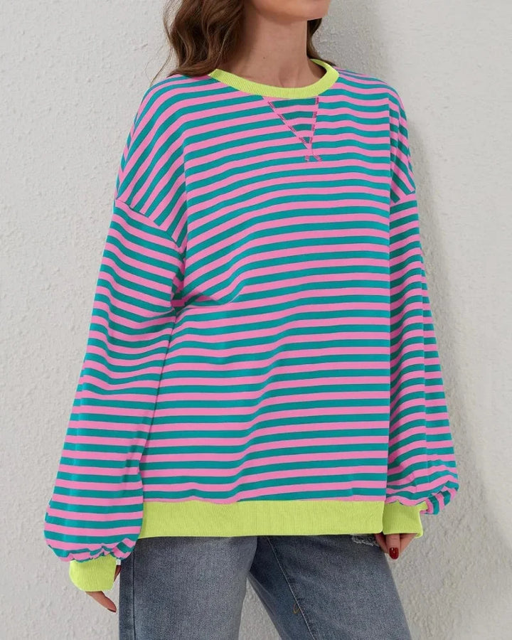 Women’s striped knit pullover with a loose fit, a casual and trendy style for autumn