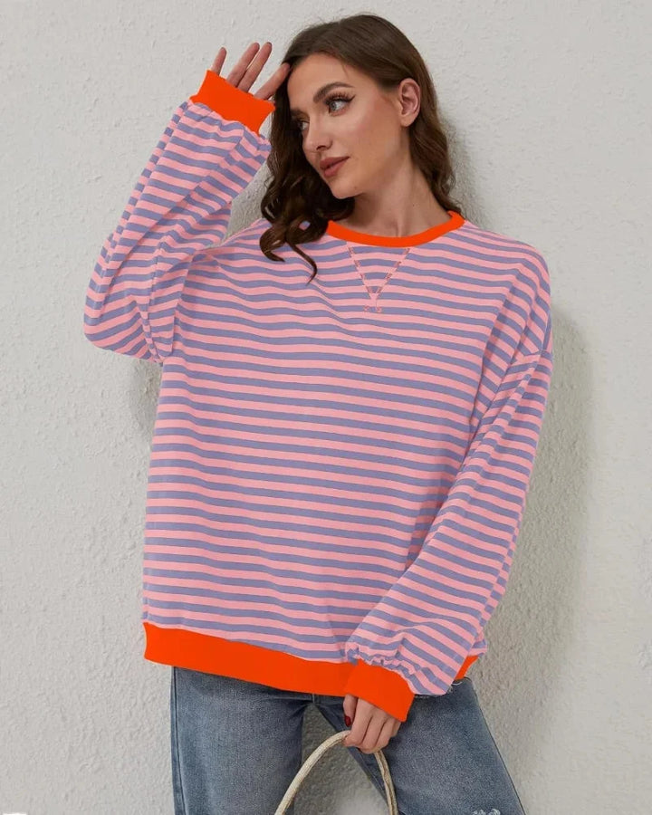Women’s striped knit pullover with a loose fit, a casual and trendy style for autumn
