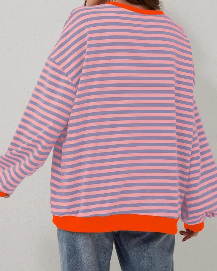 Women’s striped knit pullover with a loose fit, a casual and trendy style for autumn