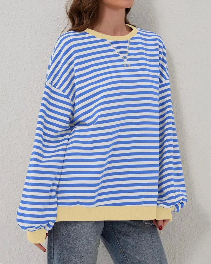 Women’s striped knit pullover with a loose fit, a casual and trendy style for autumn