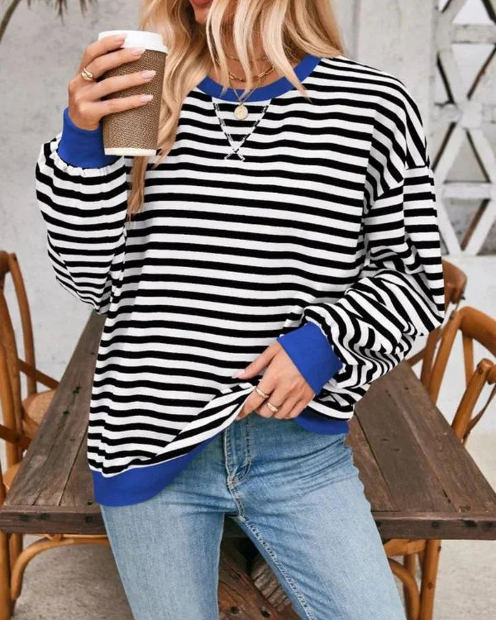 Women’s striped knit pullover with a loose fit, a casual and trendy style for autumn