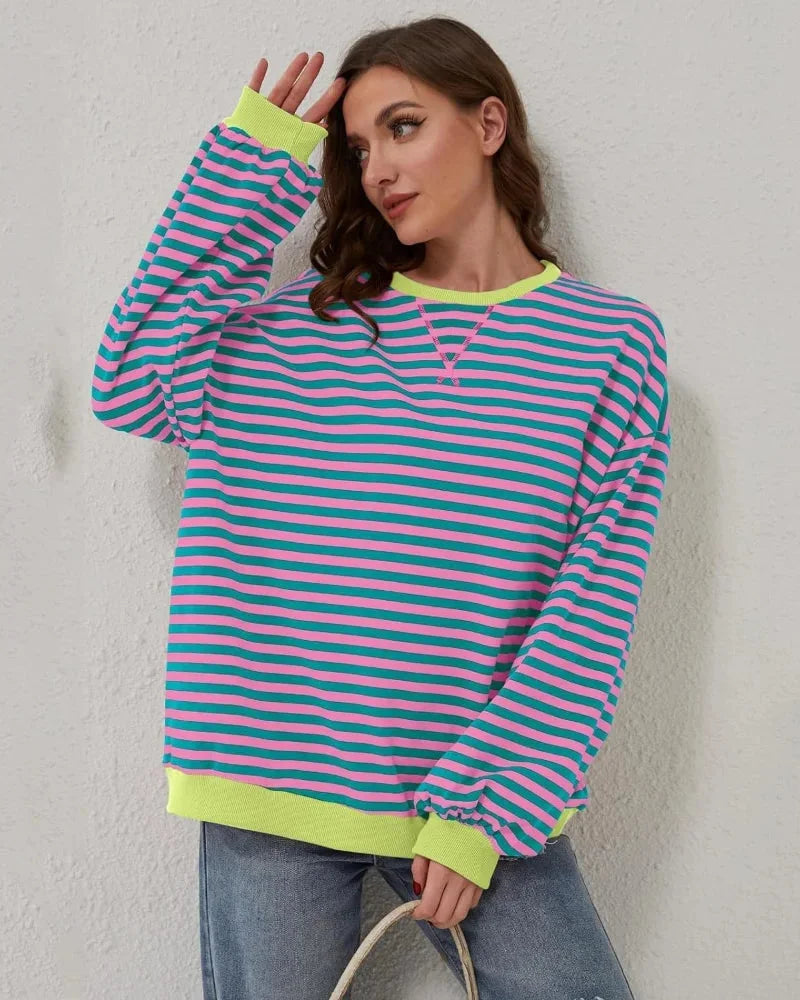 Women’s striped knit pullover with a loose fit, a casual and trendy style for autumn