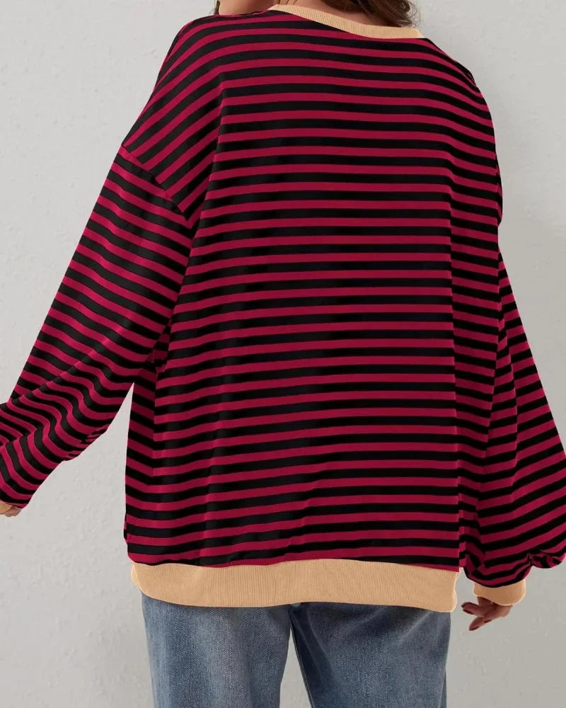 Women’s striped knit pullover with a loose fit, a casual and trendy style for autumn