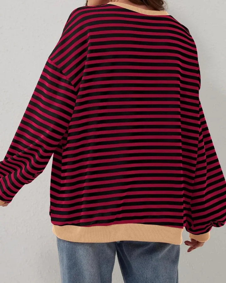 Women’s striped knit pullover with a loose fit, a casual and trendy style for autumn