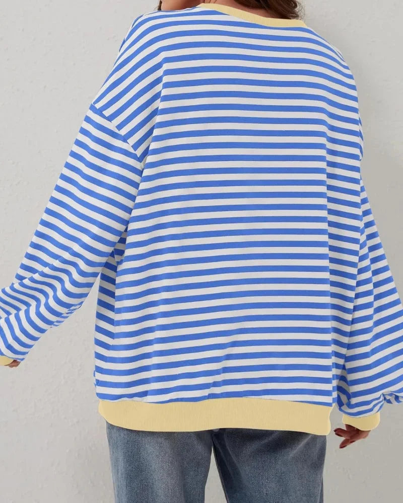 Women’s striped knit pullover with a loose fit, a casual and trendy style for autumn