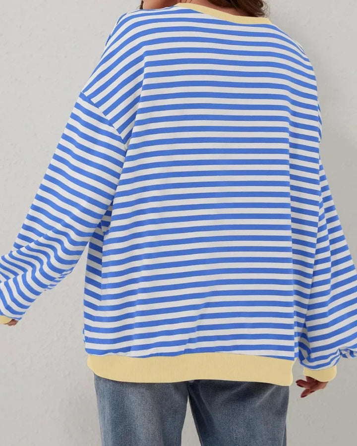 Women’s striped knit pullover with a loose fit, a casual and trendy style for autumn