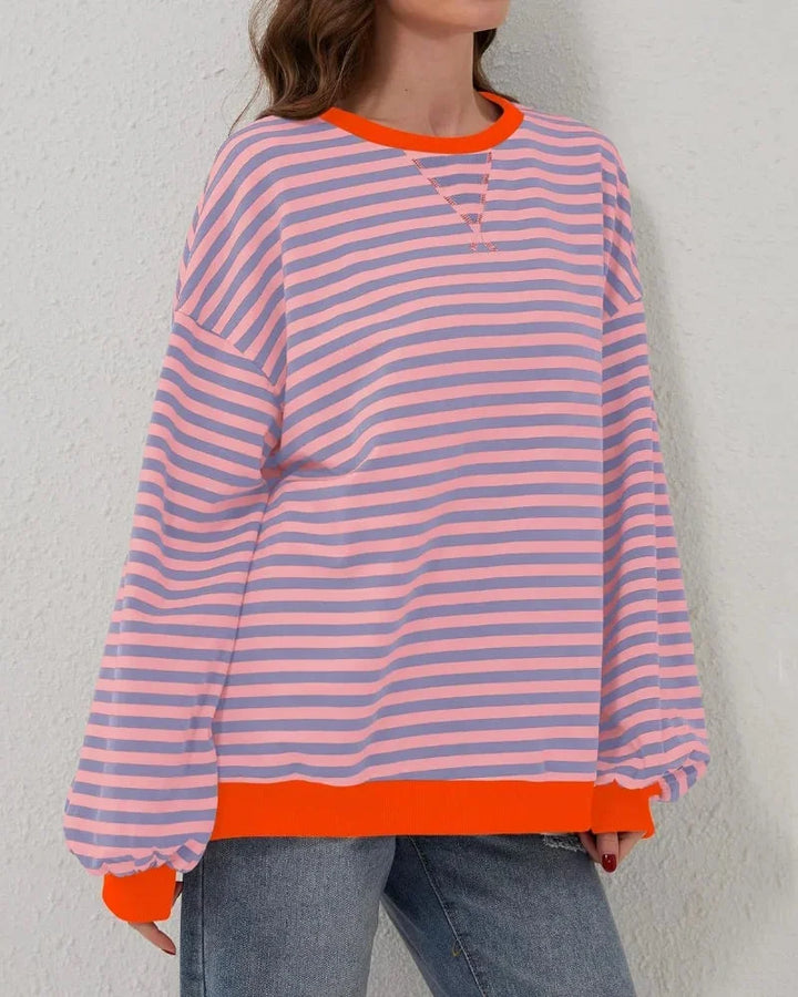 Women’s striped knit pullover with a loose fit, a casual and trendy style for autumn