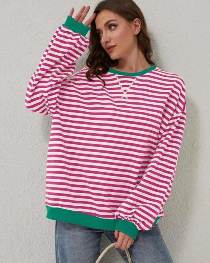 Women’s striped knit pullover with a loose fit, a casual and trendy style for autumn