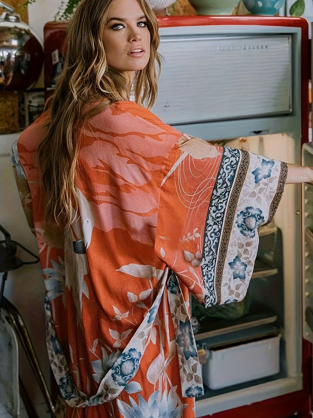 https://cdn.shopify.com/s/files/1/0998/9200/3147/files/red-floral-print-kimono-isabella-red-orange-one-size-state_of_style-2.jpg?v=1766661050