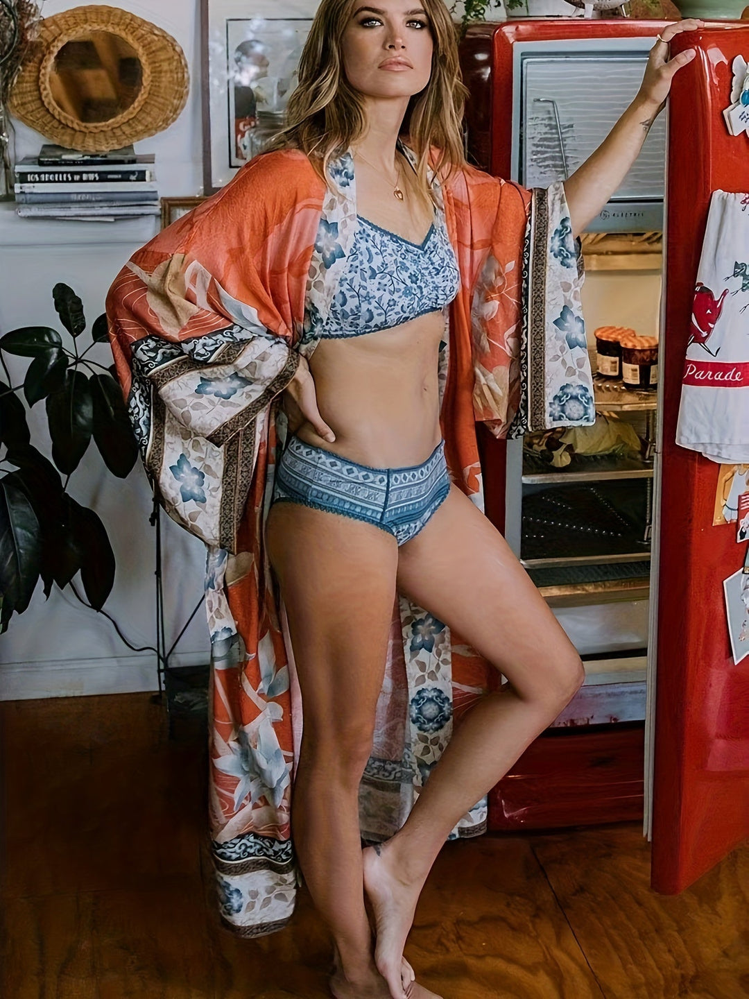 https://cdn.shopify.com/s/files/1/0998/9200/3147/files/red-floral-print-kimono-isabella-red-orange-one-size-state_of_style-4.jpg?v=1766661051