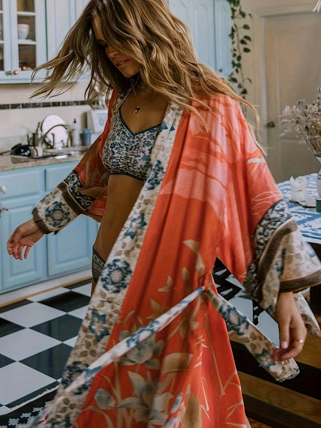 https://cdn.shopify.com/s/files/1/0998/9200/3147/files/red-floral-print-kimono-isabella-red-orange-one-size-state_of_style-5.jpg?v=1766661051