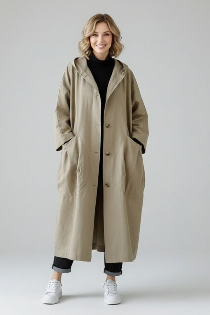 Long oversized women's hooded raincoat for autumn
