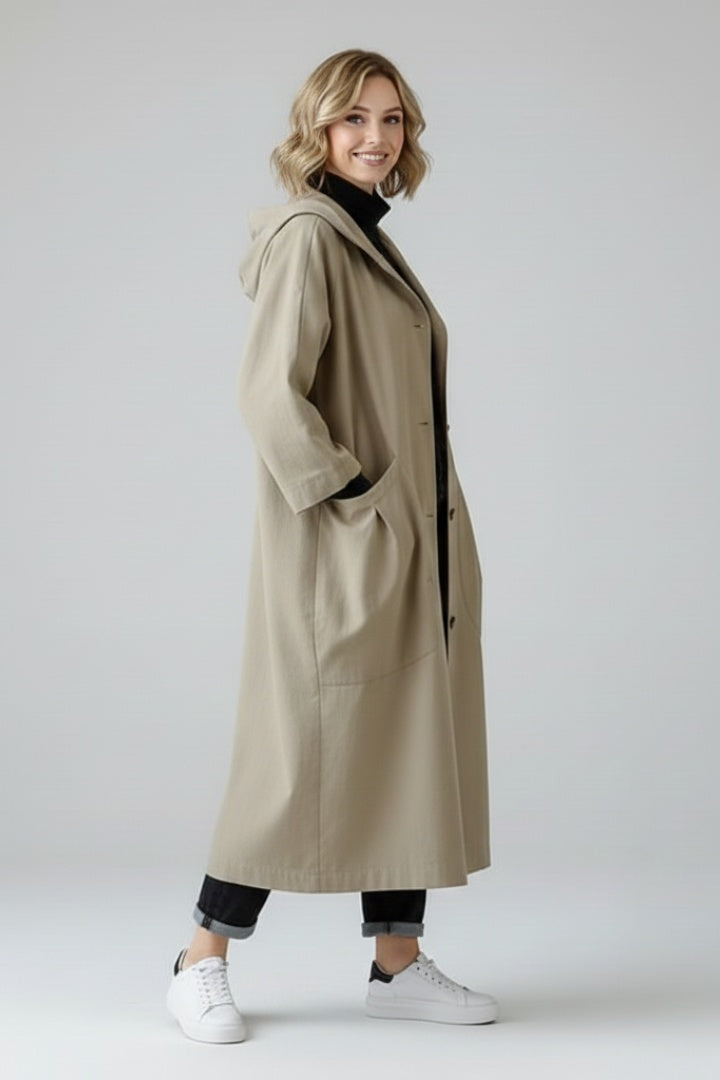 Long oversized women's hooded raincoat for autumn