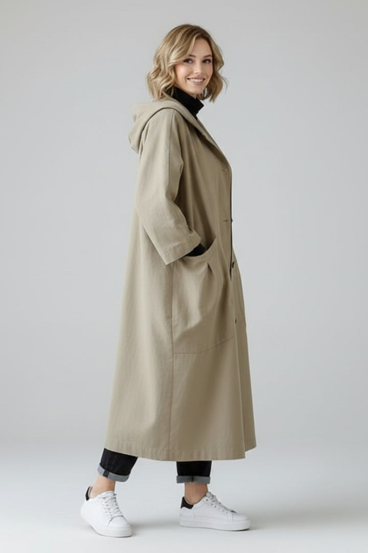 Long oversized women's hooded raincoat for autumn