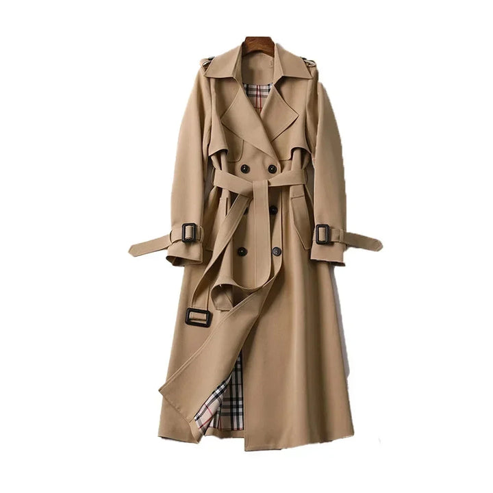 Long trench-style women’s coat with a belt and elegant notched collar for autumn