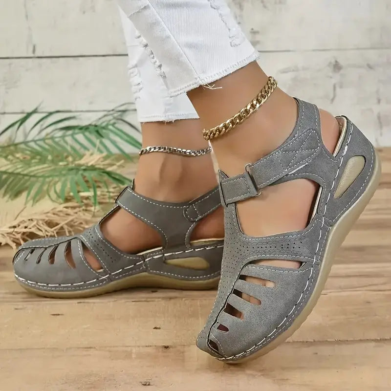 https://cdn.shopify.com/s/files/1/0998/9200/3147/files/trendy-womens-comfort-sandals-with-orthopedic-support-mirella-gray-3-state_of_style-4.webp?v=1766840317