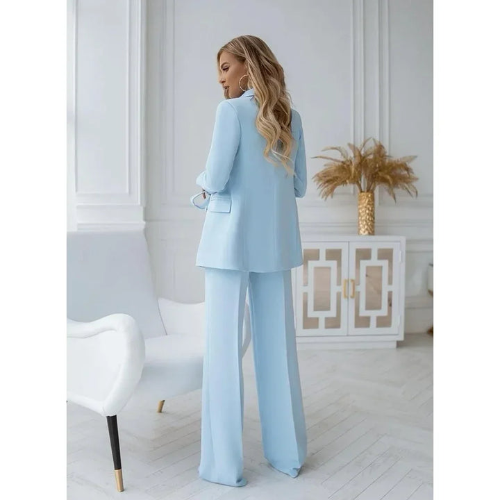 https://cdn.shopify.com/s/files/1/0998/9200/3147/files/two-piece-light-blue-trouser-suit-set-with-double-breasted-design-vivienne-s-state_of_style-3.webp?v=1766666540