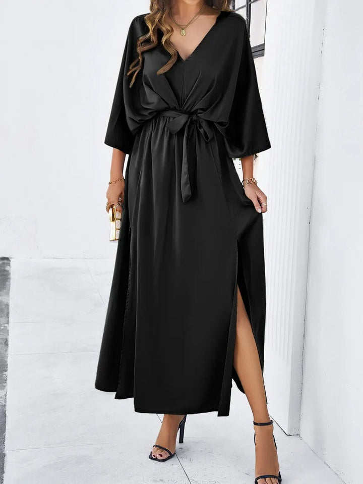 https://cdn.shopify.com/s/files/1/0998/9200/3147/files/v-neck-spring-dress-isabella-black-s-state_of_style-4.jpg?v=1766661050