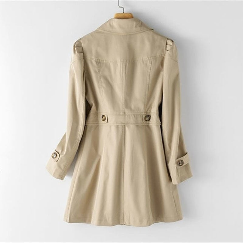 Long cotton trench coat for women with lapels, ideal for the transitional season and autumn