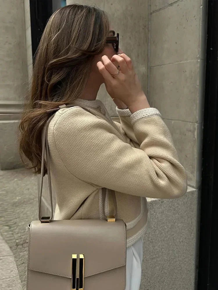 Veste courte femme en maille effet tweed, élégante et raffinée pour l’automne