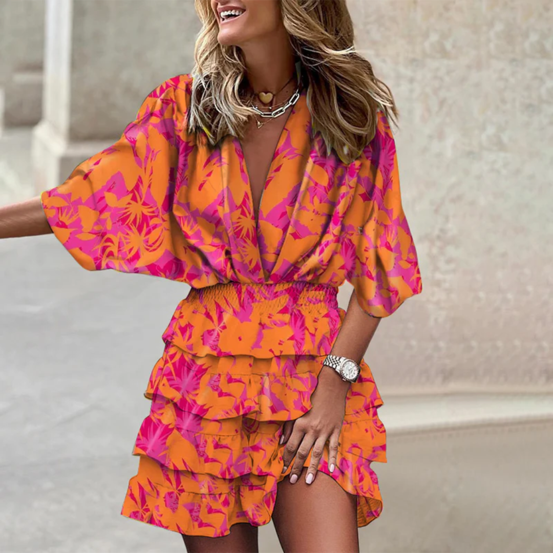 https://cdn.shopify.com/s/files/1/0998/9200/3147/files/vibrant-mini-dress-sophie-orange-s-state_of_style-5.png?v=1766661058